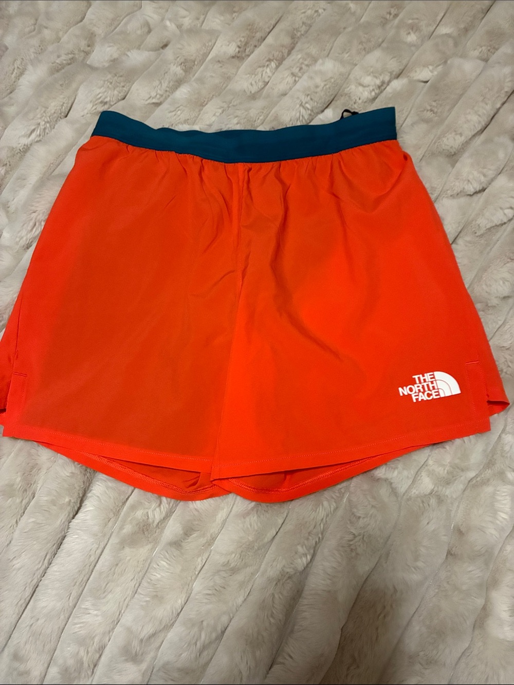 The North Face Orange Running Shorts with Teal Waistband